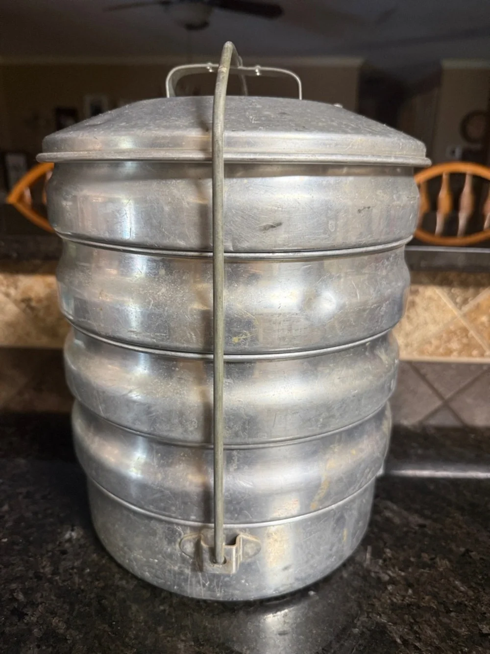 This vintage item is a Regal Aluminum Picnic Carrier.